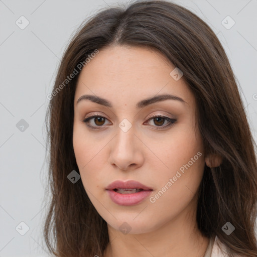 Neutral white young-adult female with long  brown hair and brown eyes