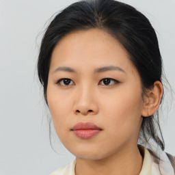 Neutral asian young-adult female with medium  black hair and brown eyes