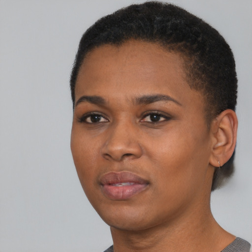 Neutral black young-adult female with short  black hair and brown eyes