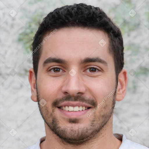 Joyful white young-adult male with short  black hair and brown eyes