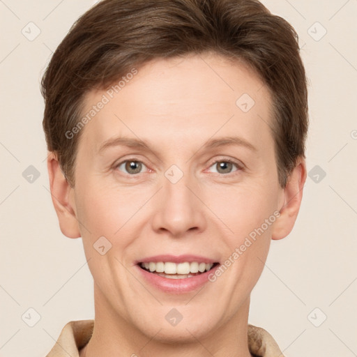 Joyful white adult female with short  brown hair and grey eyes