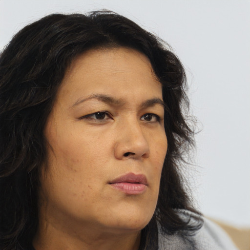 Neutral asian young-adult female with long  brown hair and brown eyes