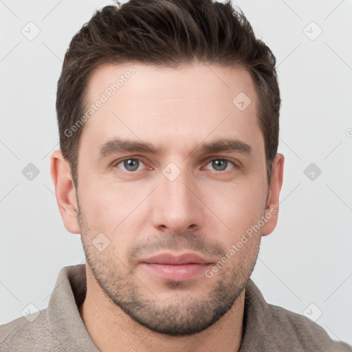 Neutral white young-adult male with short  brown hair and grey eyes