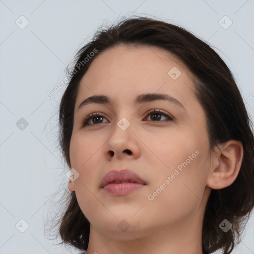 Neutral white young-adult female with medium  brown hair and brown eyes