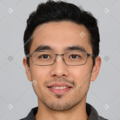 Joyful white young-adult male with short  black hair and brown eyes