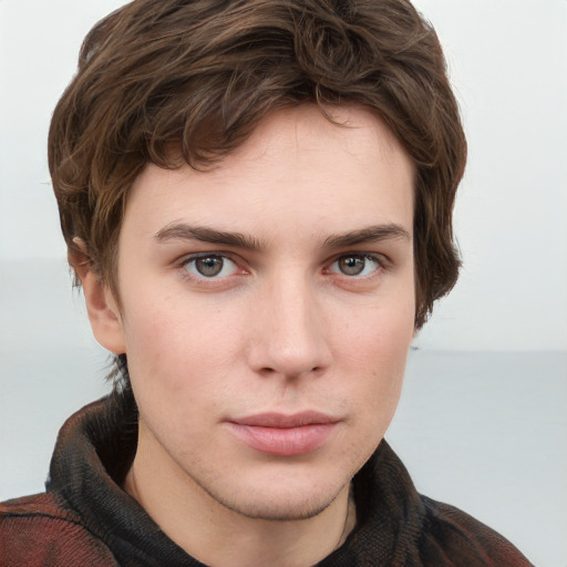 Neutral white young-adult male with short  brown hair and grey eyes