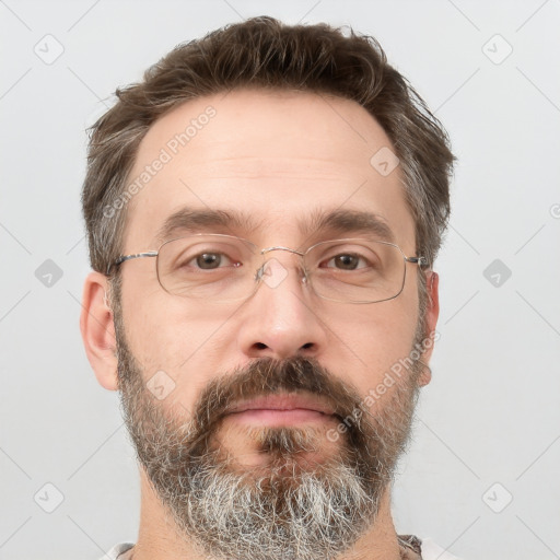 Neutral white adult male with short  brown hair and grey eyes