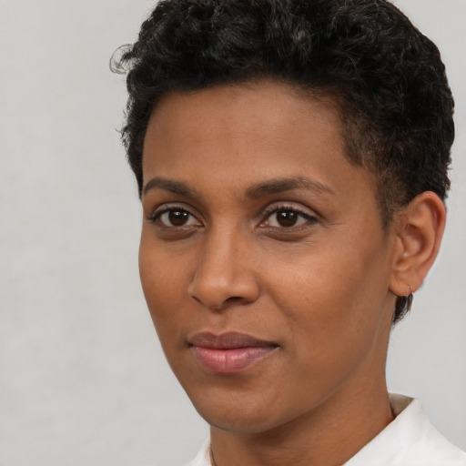 Neutral latino young-adult female with short  brown hair and brown eyes