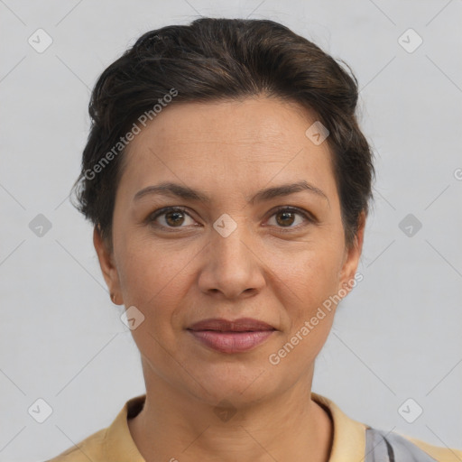 Joyful white adult female with short  brown hair and brown eyes