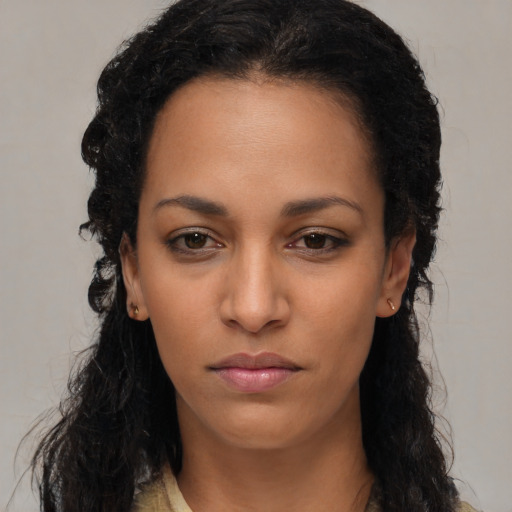 Neutral latino young-adult female with long  black hair and brown eyes
