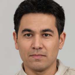 Neutral white young-adult male with short  black hair and brown eyes