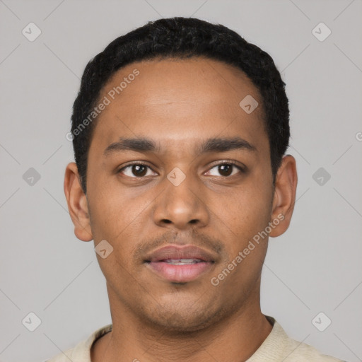 Neutral latino young-adult male with short  black hair and brown eyes