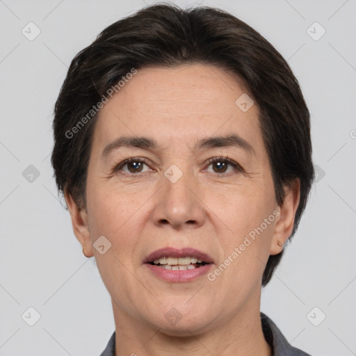 Joyful white adult female with short  brown hair and brown eyes