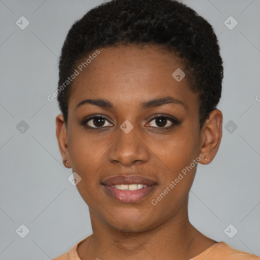 Joyful black young-adult female with short  brown hair and brown eyes