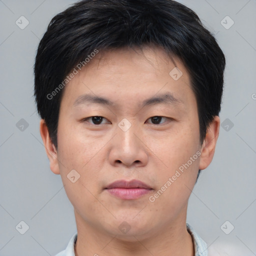 Neutral asian young-adult male with short  brown hair and brown eyes