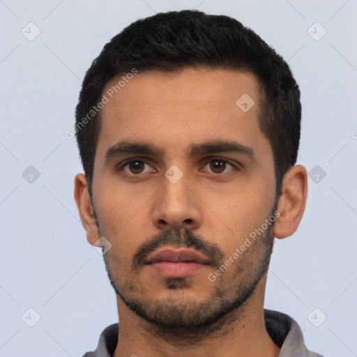 Neutral latino young-adult male with short  black hair and brown eyes