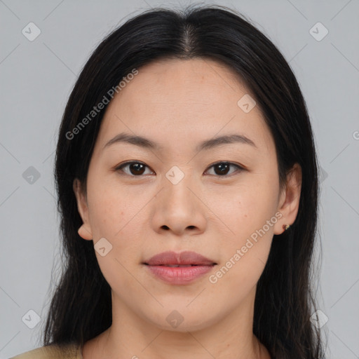 Joyful asian young-adult female with medium  black hair and brown eyes