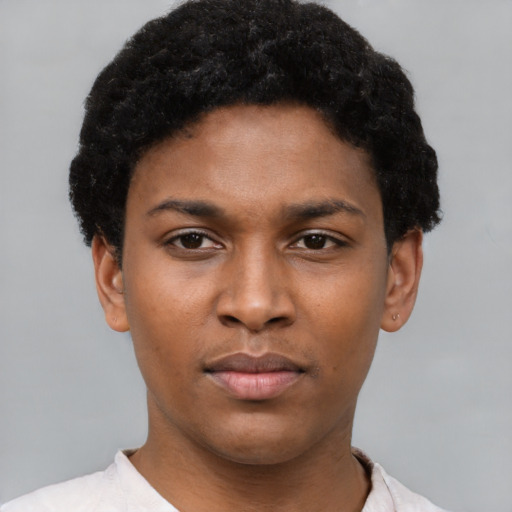 Neutral latino young-adult male with short  brown hair and brown eyes