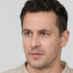 Neutral white adult male with short  brown hair and brown eyes