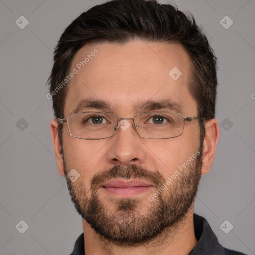 Joyful white adult male with short  brown hair and brown eyes