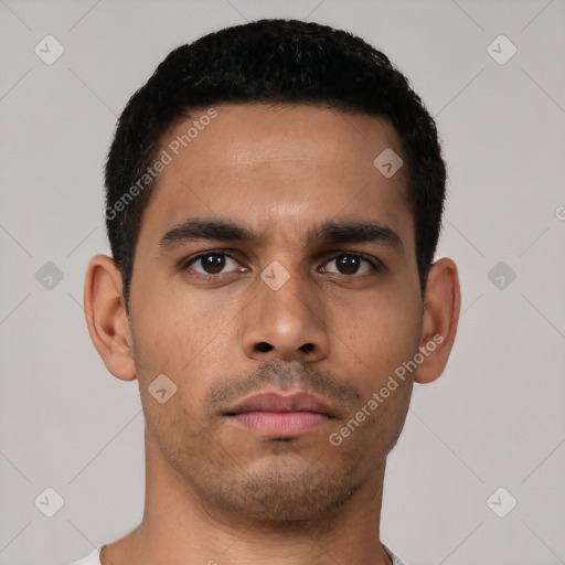 Neutral latino young-adult male with short  black hair and brown eyes