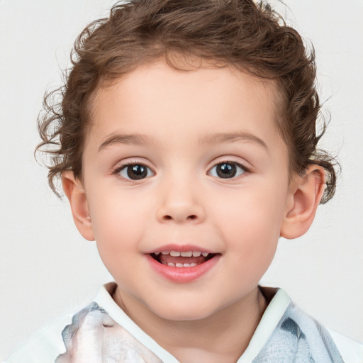 Joyful white child male with short  brown hair and brown eyes