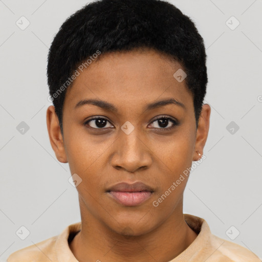 Joyful black young-adult female with short  black hair and brown eyes