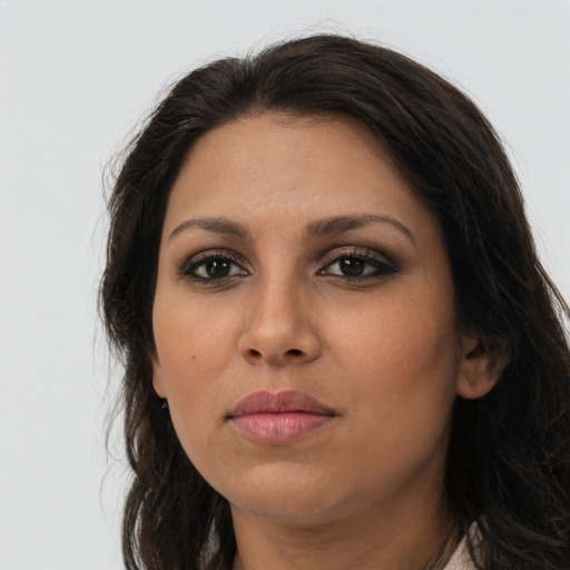 Neutral latino young-adult female with long  brown hair and brown eyes