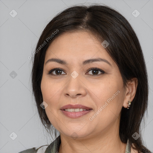 Joyful white adult female with medium  brown hair and brown eyes
