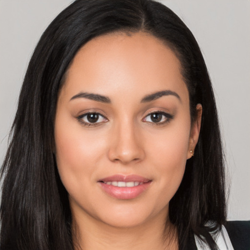 Joyful white young-adult female with long  black hair and brown eyes