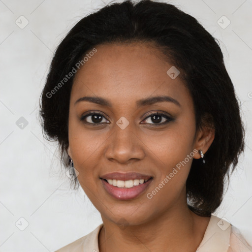 Joyful black young-adult female with medium  black hair and brown eyes