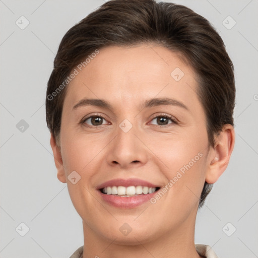 Joyful white young-adult female with short  brown hair and brown eyes