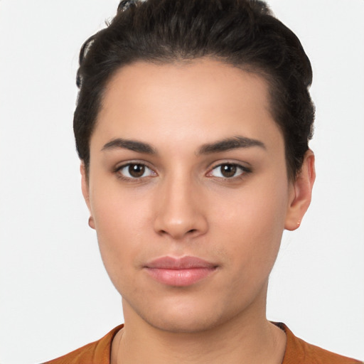 Neutral latino young-adult female with short  black hair and brown eyes