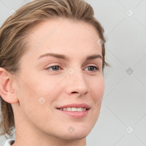 Joyful white young-adult female with medium  brown hair and blue eyes