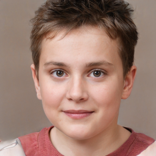 Joyful white child male with short  brown hair and brown eyes