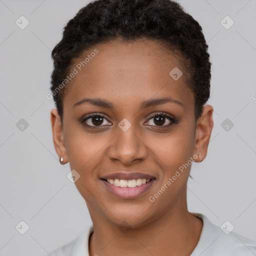 Joyful black young-adult female with short  brown hair and brown eyes