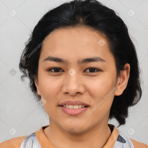 Joyful latino young-adult female with medium  brown hair and brown eyes