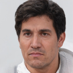 Neutral white adult male with short  brown hair and brown eyes