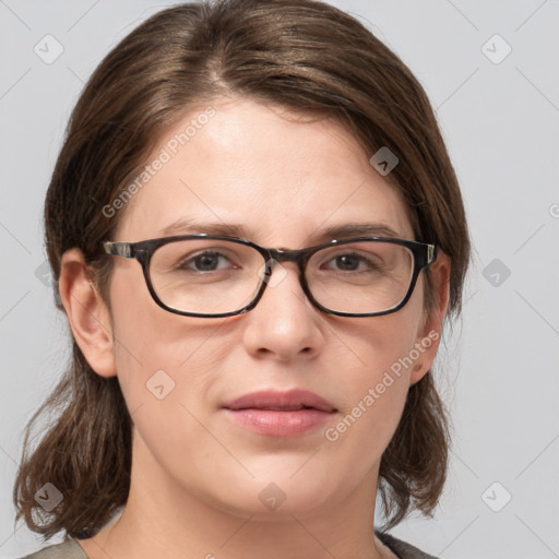 Joyful white young-adult female with medium  brown hair and blue eyes