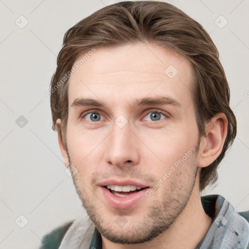 Neutral white young-adult male with short  brown hair and grey eyes