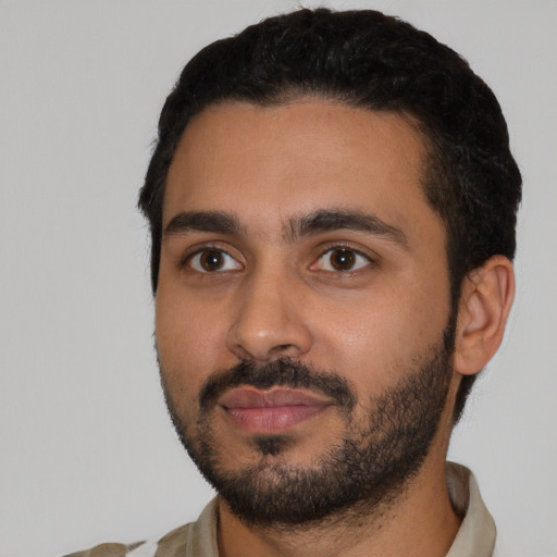Neutral latino young-adult male with short  black hair and brown eyes