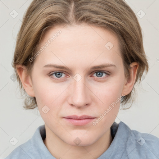 Joyful white young-adult female with medium  brown hair and blue eyes