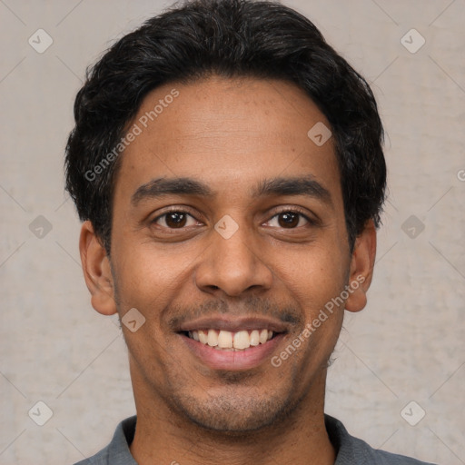 Joyful latino young-adult male with short  black hair and brown eyes