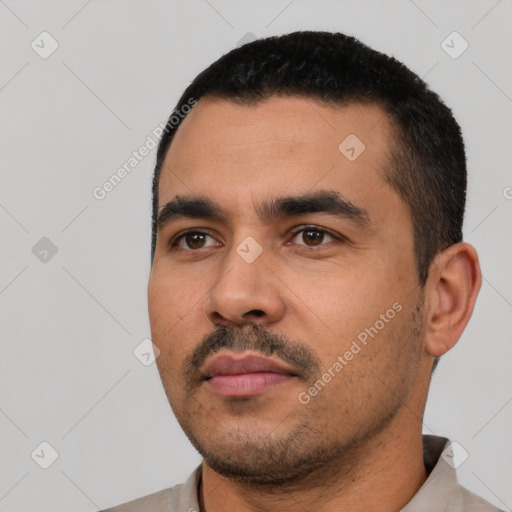 Neutral latino young-adult male with short  black hair and brown eyes