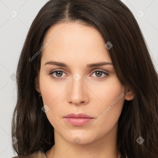 Neutral white young-adult female with long  brown hair and brown eyes