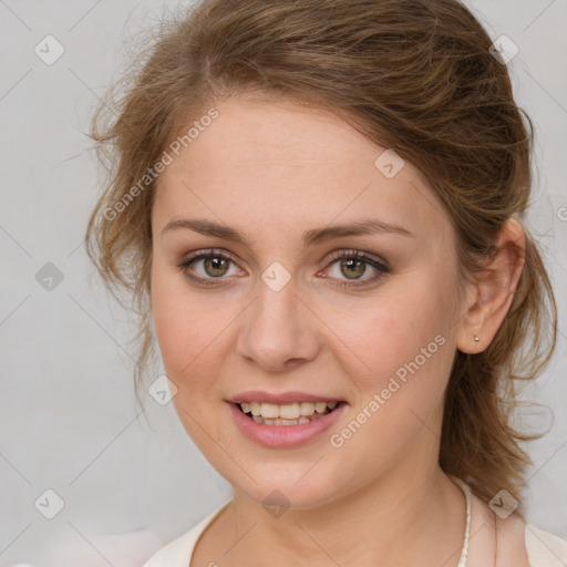 Joyful white young-adult female with medium  brown hair and green eyes