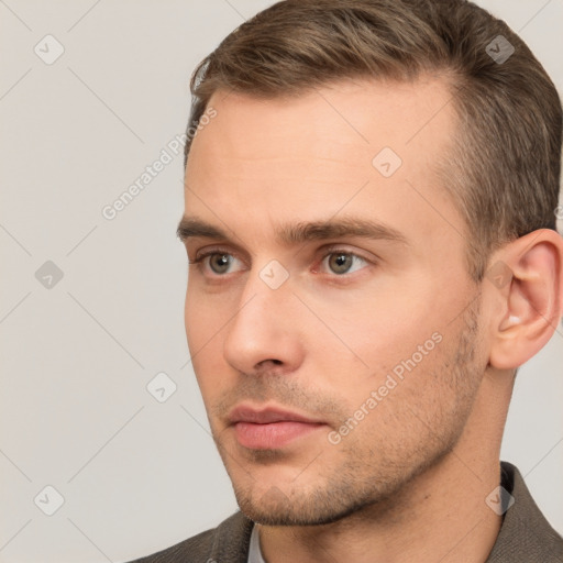 Neutral white young-adult male with short  brown hair and brown eyes