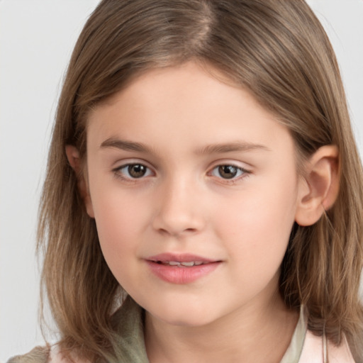 Joyful white child female with medium  brown hair and brown eyes