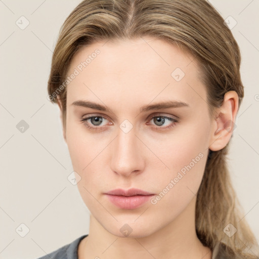 Neutral white young-adult female with long  brown hair and grey eyes