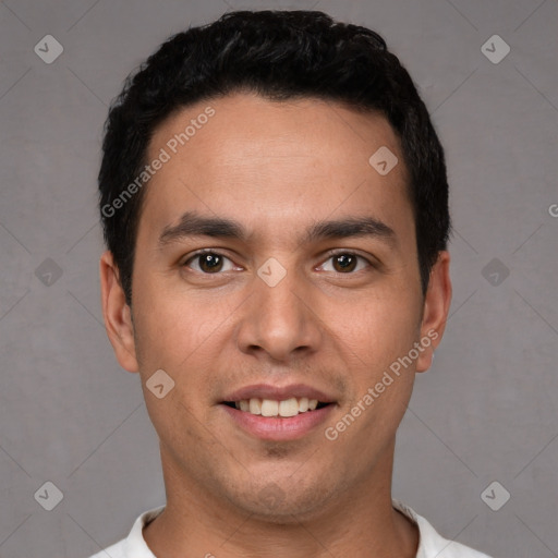 Joyful white young-adult male with short  black hair and brown eyes